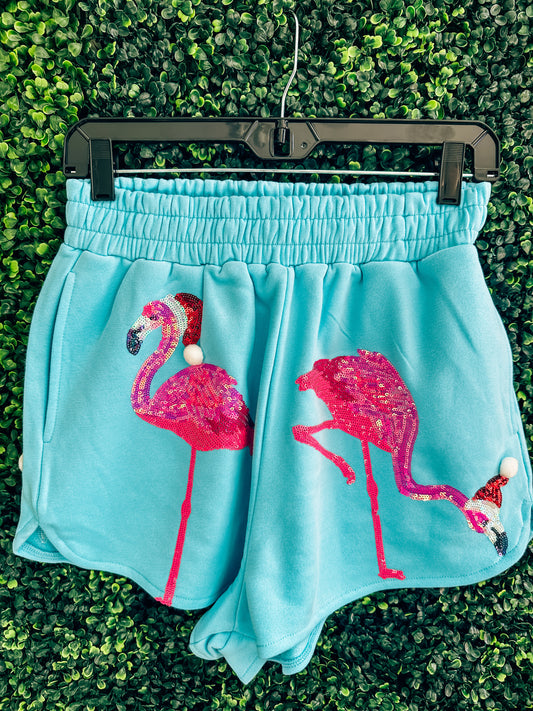 Queen of Sparkles Aqua Flamingo In Santa Hats Shorts